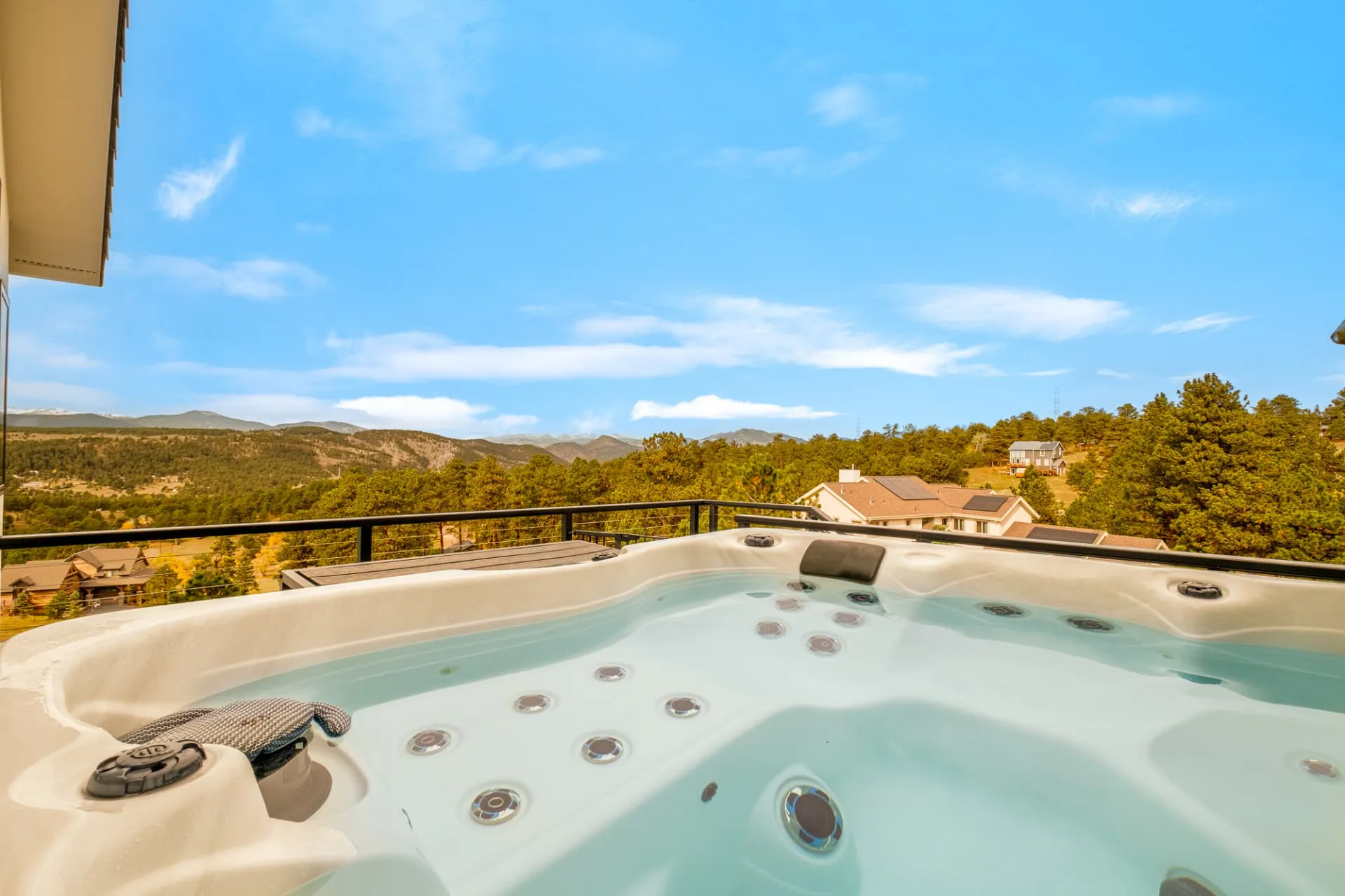 Hot tub on the deck with views across the valley